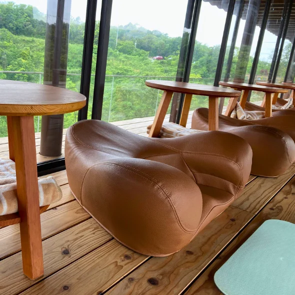 Yoga chairs and side tables at the ZEN deck