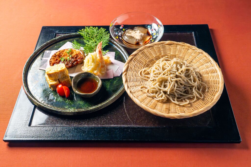 Zaru soba noodles with shrimp tempura and seasonal Japanese side dishes