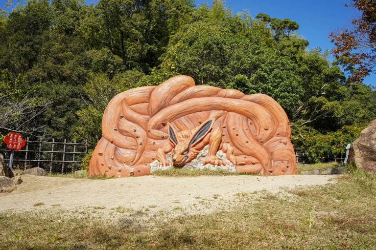 Statue of Kurama nine tailed demon fox at Naruto Shinobi-Zato in Nijigen no Mori on Awaji Island